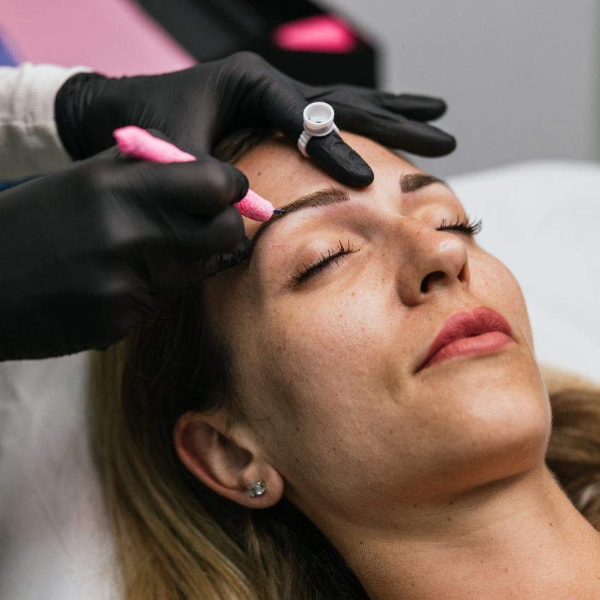 Professional microblading procedure in progress